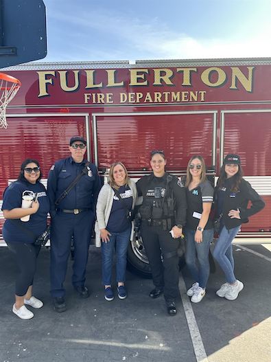   FSD staff with Fullerton PD at Champions Block Party 