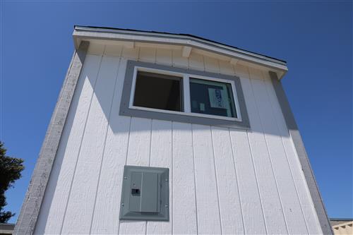 Window casing is installed and painted.